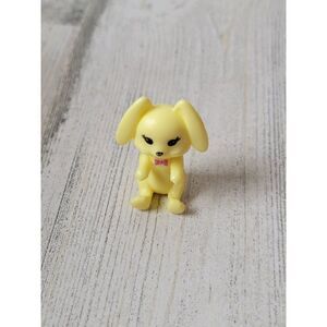 Sitting yellow Bunny Easter rabbit mini toy figure